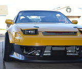 Installed Nissan 240SX S13 Pop Up Headlight Lids on yellow S13